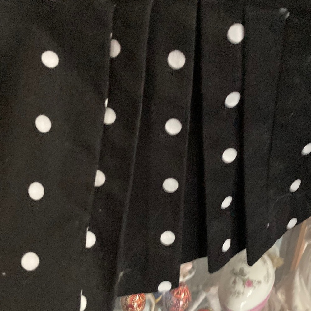 Blk. Polka dot pencil skirt like new not worn much.